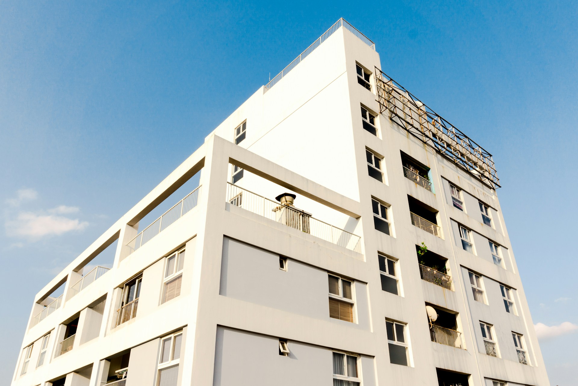 white concrete building under blue sky during daytime